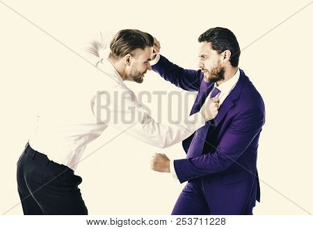 Businessmen Fighting At Workplace. Business Conflict Concept. Young Men In Formal Wear Or Businessm