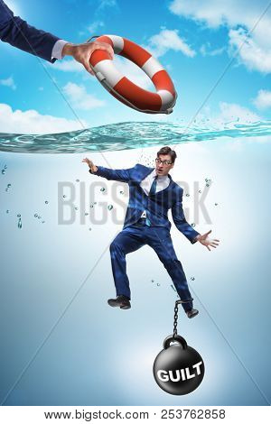 Businessman being saved from quilt