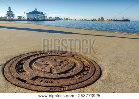 New Orleans, Usa - Nov 26, 2017: Close View Of Cast Iron Roadside Drain Plate. New Canal Lighthouse 