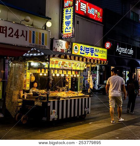 Suwon, South Korea - June 14, 2017: Vendor Woman Waiting Of Buyers In Her Fast Food Kiosk At Main St