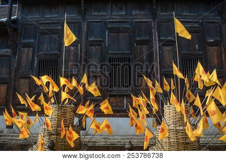 Thammachak Flags At An Ancient Buddhist Temple In Chiang Mai, Thailand.