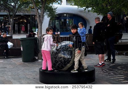 Australian People Children Playing Stone Circle At Patio Outdoor Activitie Of Myer Shopping Mall In