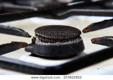 A Very Old Rust Cooker. View On Gas Burners Especially On One. Good Thing
