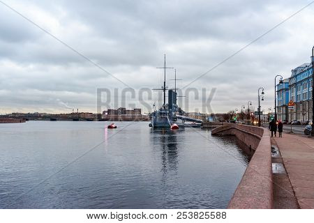 Saint Petersburg, Russia - December 30, 2017: View Of The Aurora Cruiser Historical Ship Next Petrog