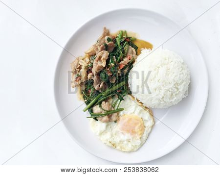 Stir Fried Water Spinach With Meal, Fried Egg In Thai Style With Rice In White Dish  On White Backgr