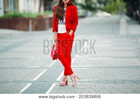 Sport Chich With High Heels In The Street.