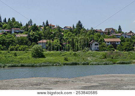 Springtime Green Forest, Glade, Reed Or Rush And House On A Beauty  Lake In Residential District Mar