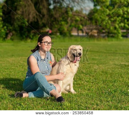Appy Dog And Owner Enjoying Nature In The Park