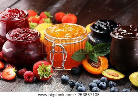 Assortment Of Jams, Seasonal Berries, Apricot, Mint And Fruits. Marmalade Or Confiture