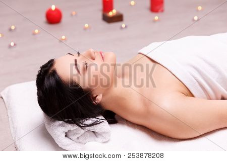 A Pleasing Massage With Candles. Spa Concept