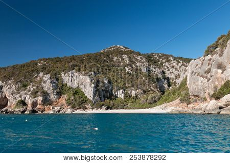 Cala Fuili Beach On The Italian Island Of Sardinia From Seaside
