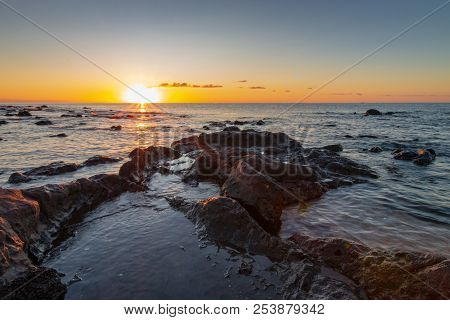 Sunrise At Palmasera Beach In Cala Gonone On The Italian Island Of Sardinia