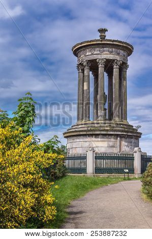Edinburgh, Scotland, Uk - June 13, 2012: Cylindrical Gray Stone Memorial For Donald Stewart On Calto