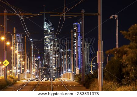 View Looking Through Gold Coasts Light Rail Tram System With Surfers Paradise Cityscape In The Backg