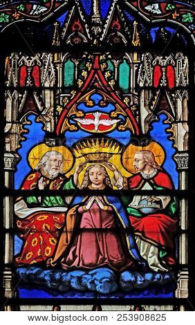 PARIS, FRANCE - JANUARY 10: Coronation of the Virgin Mary, stained glass window in the Saint Eugene - Saint Cecilia Church, Paris, France on January 10, 2018.