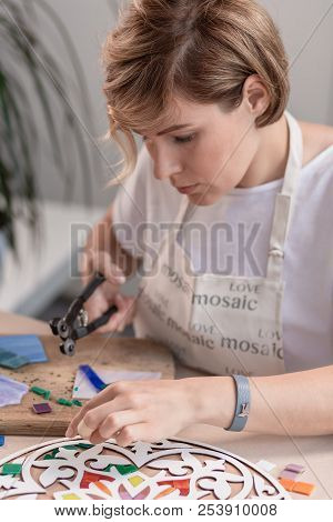 Workplace Of The Mosaic Master: Women's Hands Holding Tool For Mosaic Details In The Process Of Maki