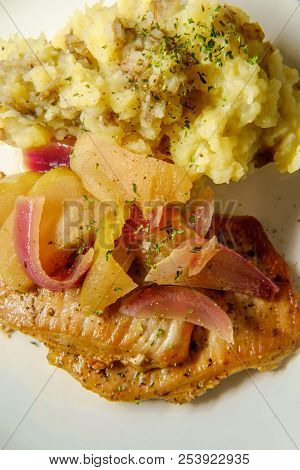 Roasted Pork Chops With Applecider Sauce Sliced Apple Red Onions And Smashed Potatoes