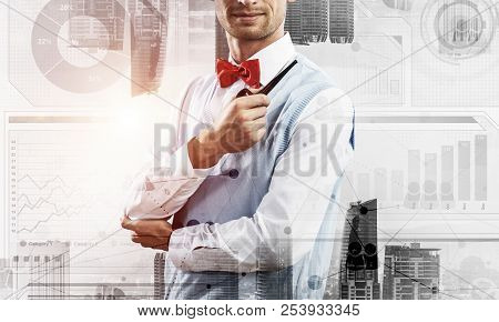Confident And Young Businessman In Smart-casual Wear Smoking Pipe And Modern Cityscape With Business