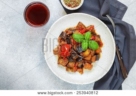 Caponata Is A Traditional Sicilian Dish. Stew Of Vegetables-eggplant, Tomatoes, Onions, Basil And Ol