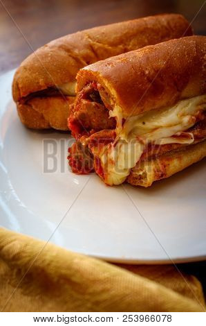 Sausage Parm Hero Sub Sandwich With Tomato Sauce Mozzarella Cheese Onions And Peppers