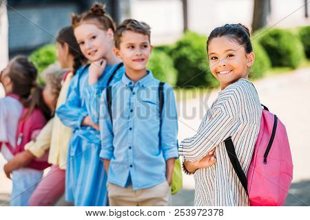 Group Of Adorable Schoolchildren Spening Time Together After School
