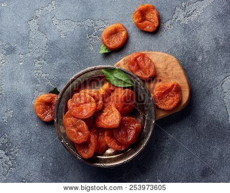 Dried Apricots On Gray Background With Copy Space. Top View.