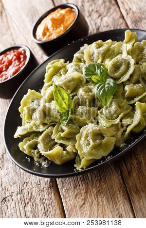 Spinach Cappelletti, Ravioli, Tortellini Stuffed With Meat With Parmesan Cheese And Basil Served Wit