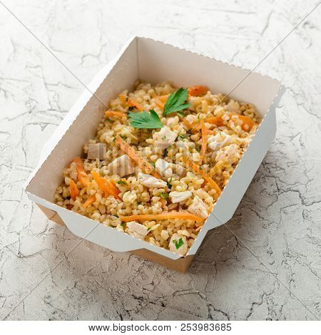 Healthy Food Delivery. Pilov From Bulgur With Chicken. Take Away Of Daily Ratio Meals In Paper Boxes