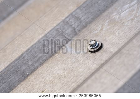 Gray Corrugated Metal Cladding On Industrial Building Roof