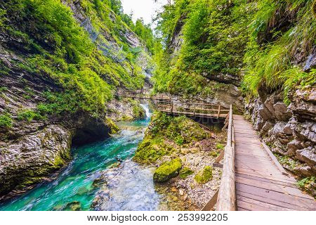 Vintgar Gorge, Slovenia. The Radovna River With Wooden Paths And Bridge Above. Beautiful Water River