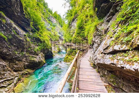 Vintgar Gorge, Slovenia. The Radovna River With Wooden Paths And Bridge Above. Beautiful Water River