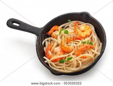 Fried Shrimps With Prepared Pasta In The Iron Pan