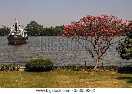 Bangkok,thailand - Feb 27, 2020 : View Of Chao Phraya  River And The Cargo Ships Flost Into  The Mid