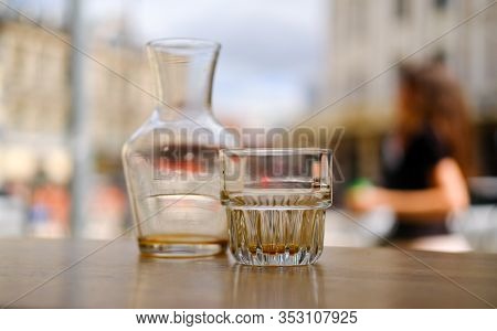 Drunk Coffee Filter.an Empty Glass Decanter And An Empty Glass Cup From Under A Coffee Filter. Filte