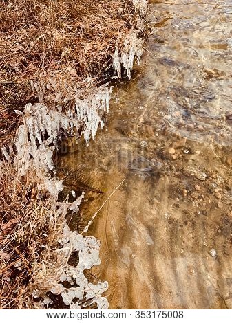 Ice On The Shore Of Burr Pond State Park In Torrington, Connecticut.