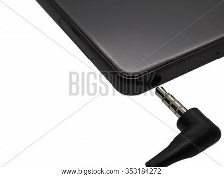Audio Headphone Jack And A Phone With A Jack For Headphones.