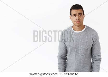 Skeptical And Unamused Good-looking Young Man, Listening Strange Conversation, Smirk Judgemental Loo