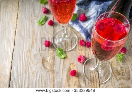 Kir Royale Cocktail With Raspberries