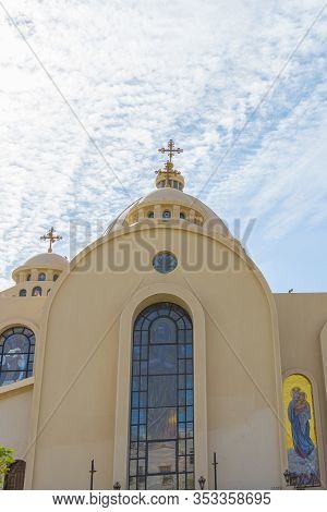 Coptic Orthodox Church In Sharm El Sheikh, Egypt.against The Backdrop Of A Beautiful Sky With Clouds