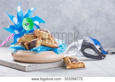 Purim. Hamantaschen. Purim Background With Carnival Mask And Hamantaschen Cookies. Holiday Celebrati