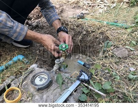 Plumber Worker Install And Repair The Pipe And Fitting Of Water Supply And Underground System Mainte