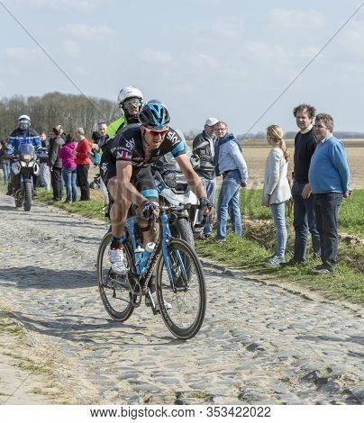 Gruson, France - April 12,2015: The English  Cyclist, Ian Stannard  Of Team Sky, Riding During Paris