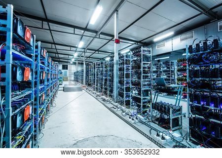 Bitcoin and crypto mining farm. Big data center. High tech server computers at work