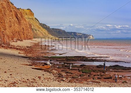 Sidmouth Beach And Red Cliffs In Devon