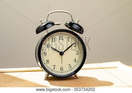 Wake Up Late, Schedule At Ten O'clock Or Afternoon Time Concept, Black Retro Alarm Clock At Ten O'cl