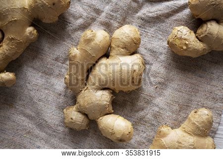 Raw Organic Ginger Root On Cloth, Top View. Flat Lay, From Above, Overhead.