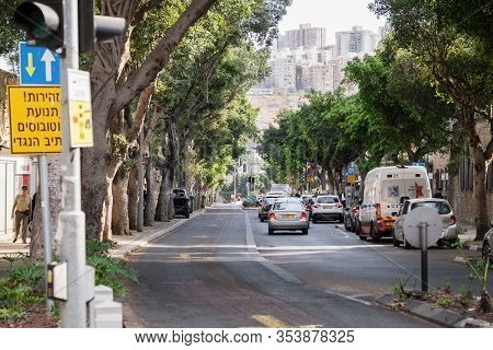 Haifa, Israel - November 21, 2019. Busy Haifa Street In Hadar District