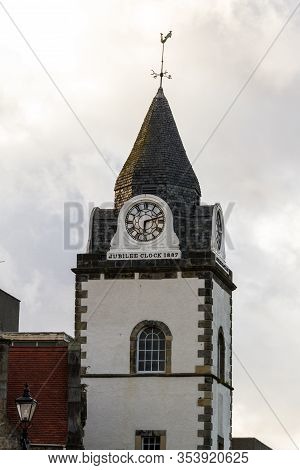 South Queensferry, Scotland  - September 16 2019: Close Up Fo The Clock Tower On The Black Castle On