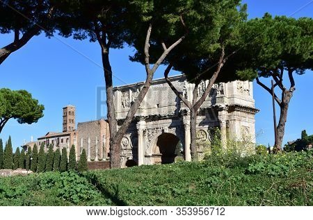 View Of Arch Of Constantine Or Arco Di Constantino With Basilica Di Santa Maria In Cosmedin Bell Tow