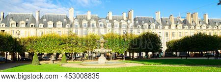 View Of Faomus Place De Vosges With Green Grass Cortyard, Paris, France